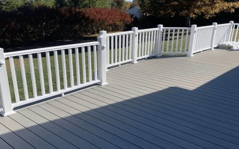 Finished grey composite deck with white railings — Hickory NC