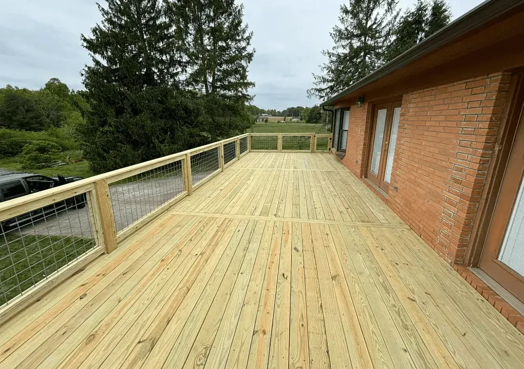 Custom wood deck with cattle fence railings — Hickory NC